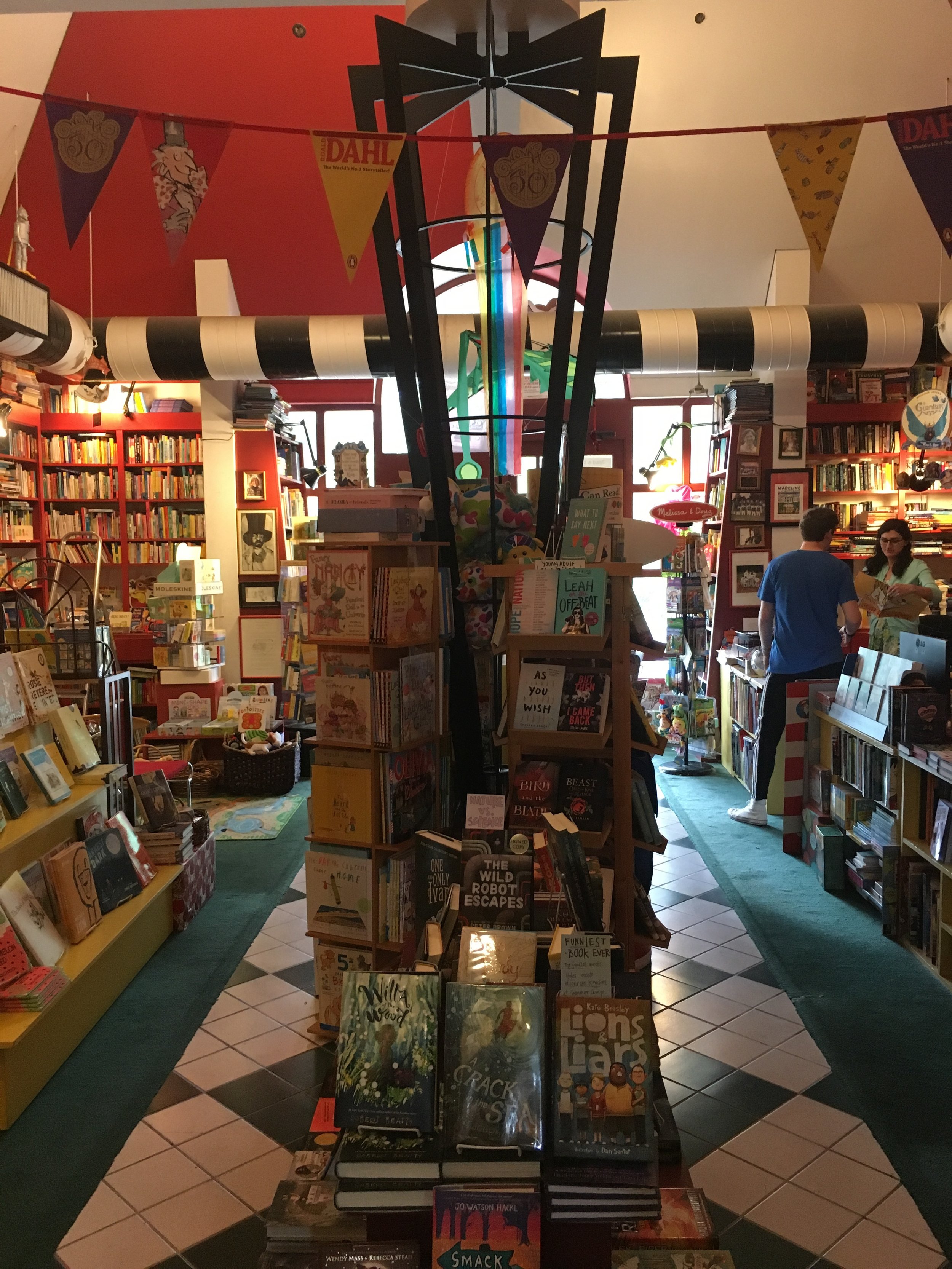 Clara Martin helping a customer at Lemuria Books in Jackson, MS.