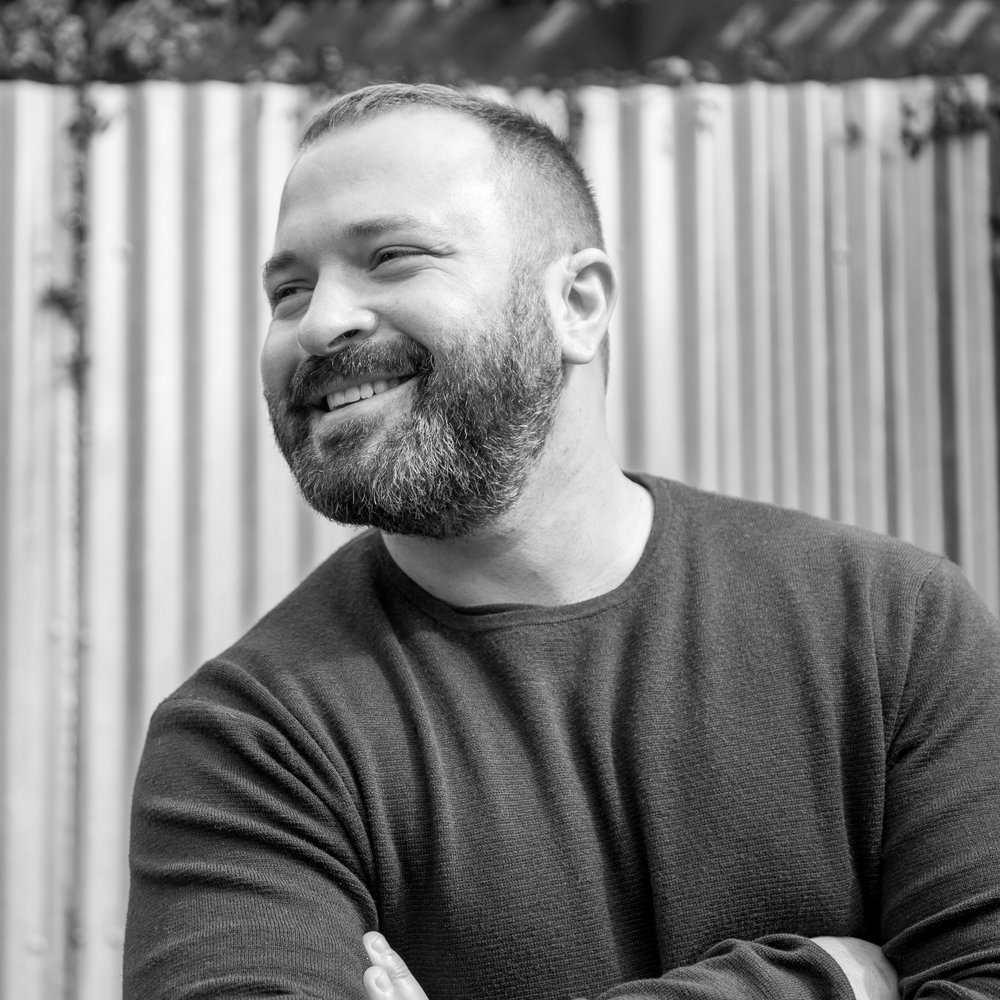 MICHAEL MINKOVITZ - Michael is a Georgia native who gained a unique perspective growing up in the only Jewish family in a tiny, rural community before ending up at New York University’s Tisch School, where he graduated with a degree in filmmaking. He later graduated from the Savannah College of Art and Design with a Master’s degree in film, but he’s also had fun being a news photographer, an SAT tutor, and running his family’s business. He was overjoyed to create and publish his first book, Thank You, Crow, with his husband, Jose.